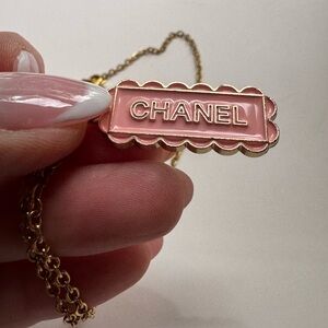 CHANEL Pink and Gold Pendant Necklace zipper pull